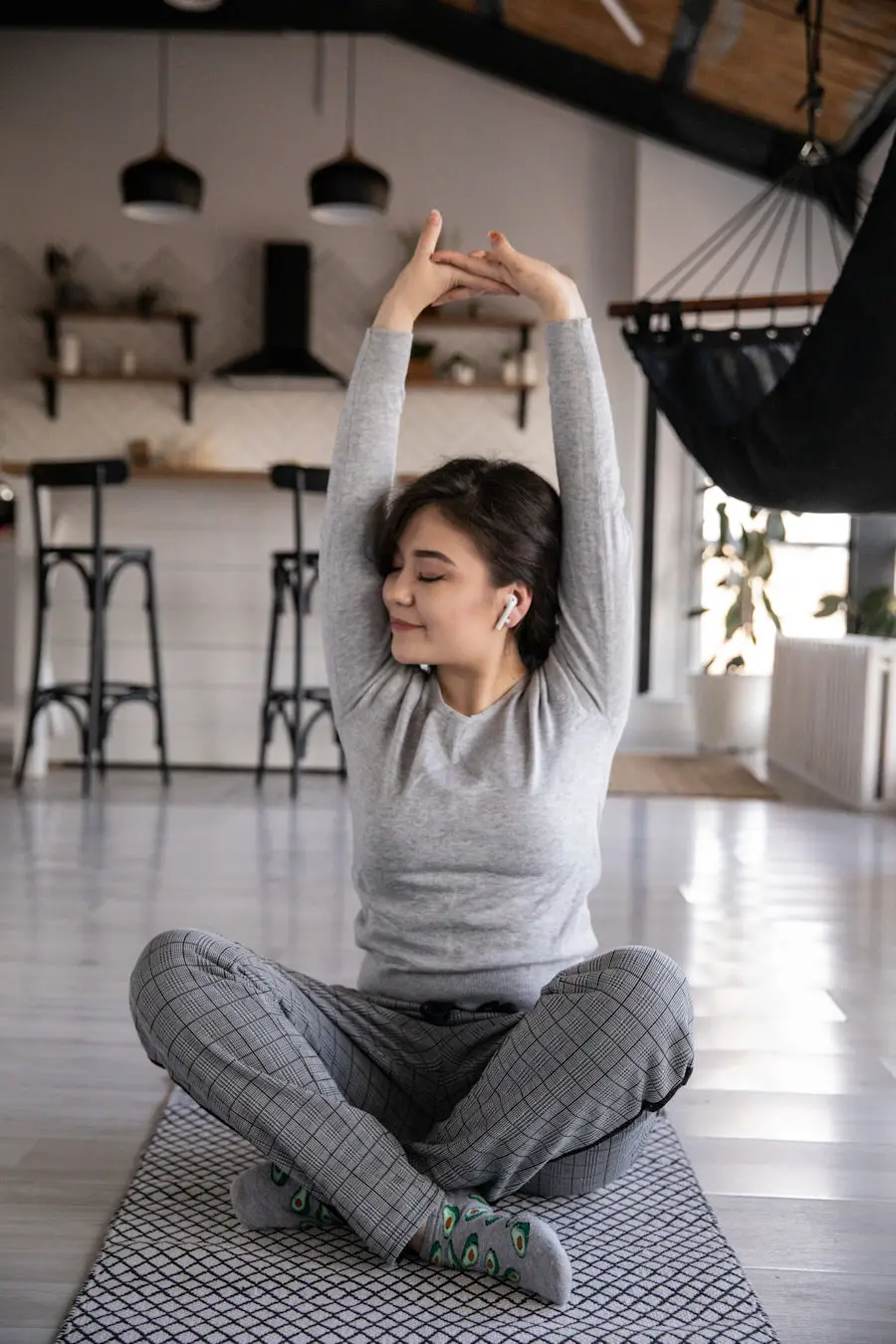 Woman stretching from floor